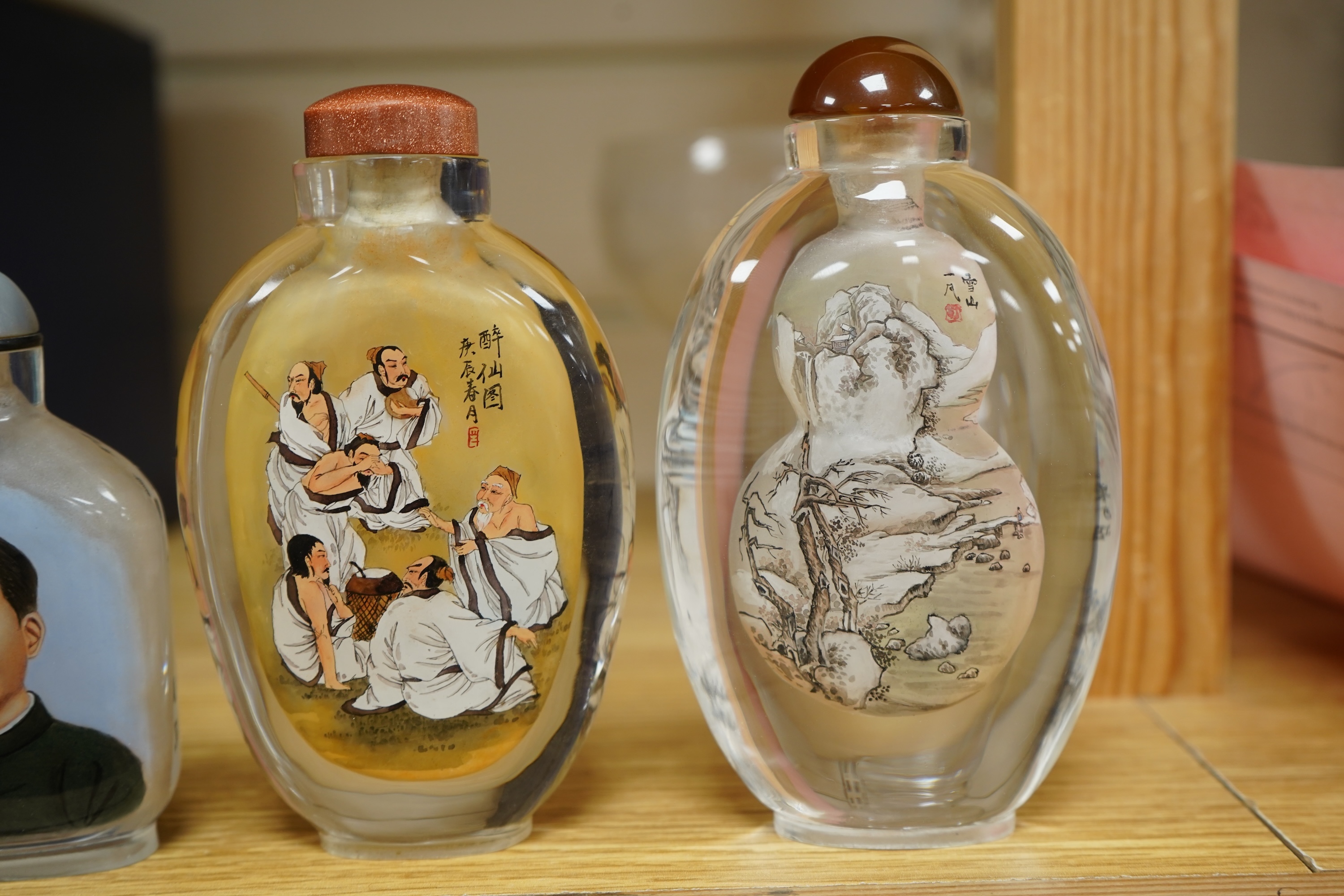 Four Chinese inside painted glass snuff bottles, 1960's-80's, tallest 13.5cm